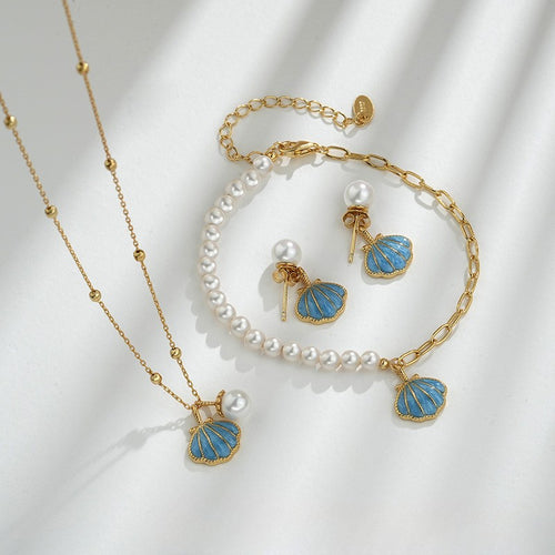 Parure or collier bracelet perles et boucles coquillage bleu